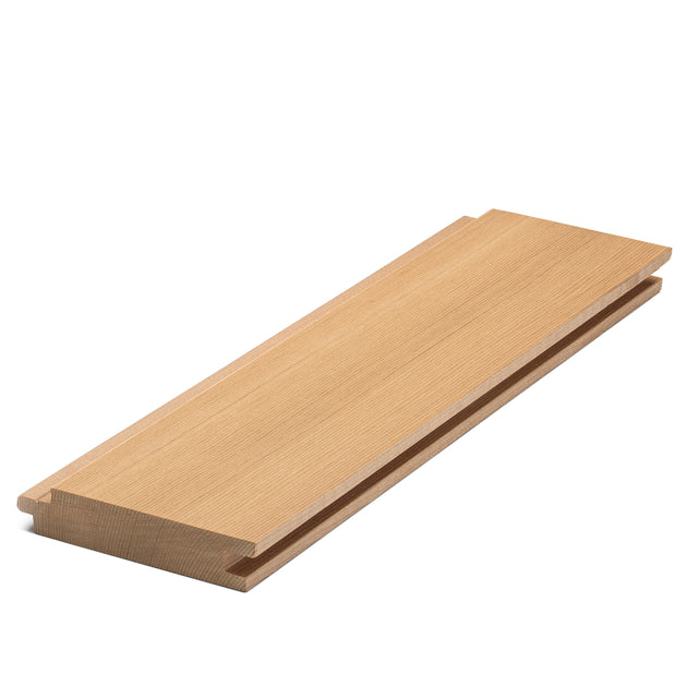 Western Red Cedar 1x4 tongue-and-groove paneling board, angled view showing face grain, tongue and groove edges