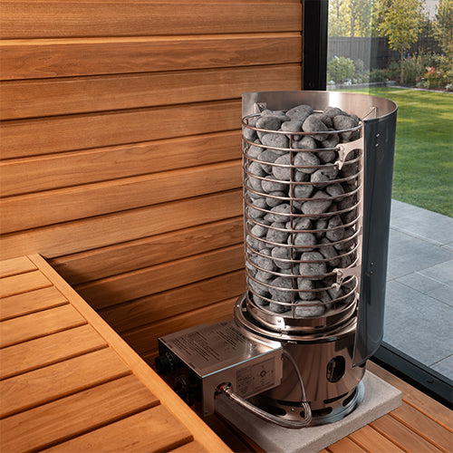 Titan SL1 with the stainless-steel heat shield installed near a wooden sauna wall