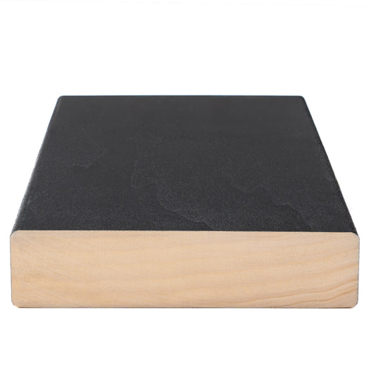 Aspen Midnight Black 2x5 bench board end view showing pale wood cross-section beneath the black textured face