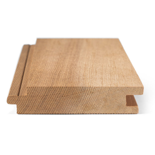 Western Red Cedar 1x4 tongue-and-groove paneling board end view showing the tongue, groove profile and cut grain