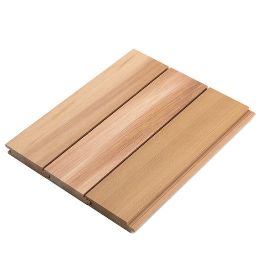 Western Red Cedar 1x4 tongue-and-groove paneling, three boards joined side by side showing face grain and color variation
