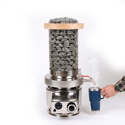 Hot water drawn from the Titan SL1 water tank's spigot into a cup