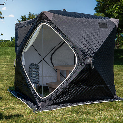 SaunaLife Titan SL1 inside a black SaunaTrekker portable sauna tent on a lawn