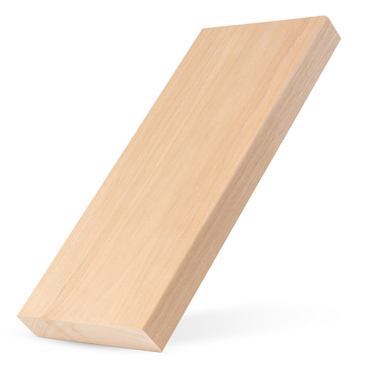 Alder 2x6 bench board propped at a tilt, showing light, even face grain and the end of the board