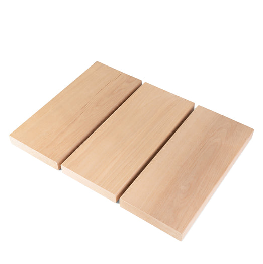 Three Alder 2x6 bench boards laid side by side, showing face grain and ends