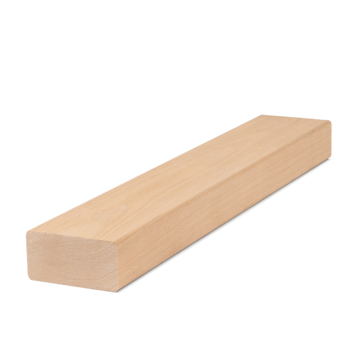 Alder 2x3 bench board lying flat, angled view showing light face grain and the rounded edge along its length