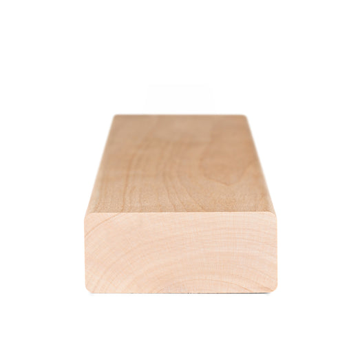 Alder 2x3 bench board end view showing growth rings in the cross-section, with face grain on top