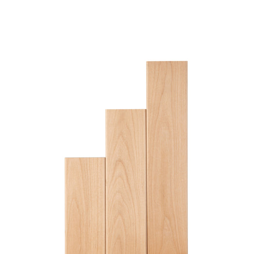 Alder 2x3 bench boards standing upright in stepped lengths, showing vertical face grain on a white background