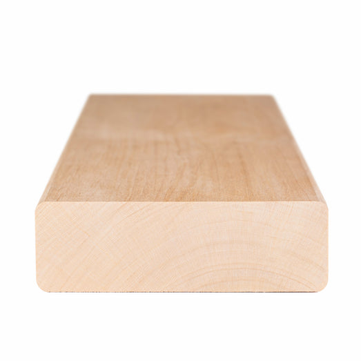 Alder 2x4 bench board end view showing the cross-section growth rings and rounded edges
