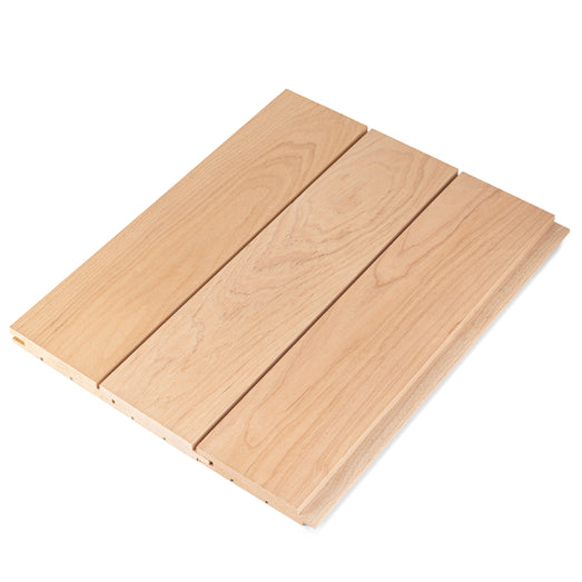 Three alder tongue-and-groove paneling boards side by side, showing face grain and edge profiles