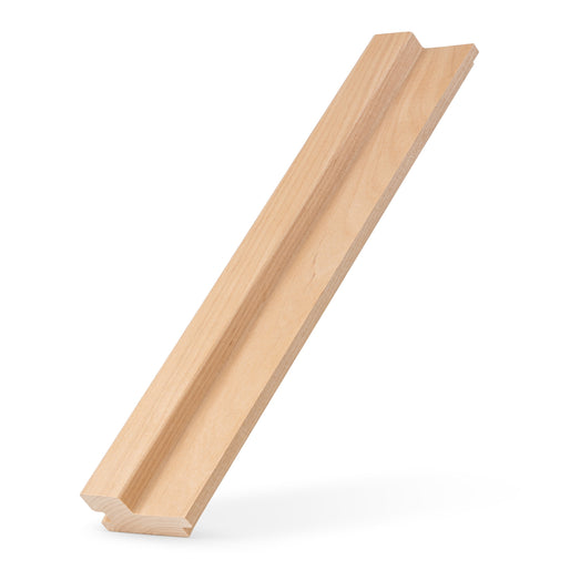 Alder 2x3 tongue-and-groove paneling board leaning at an angle, showing the long face and raised ridge
