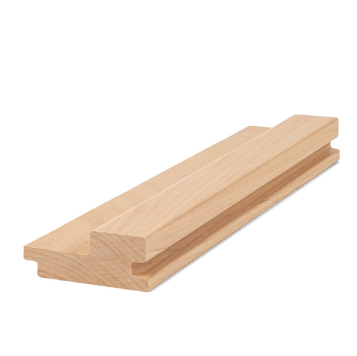Alder 2x3 tongue-and-groove paneling board at an angle, showing the stepped profile and groove along the side