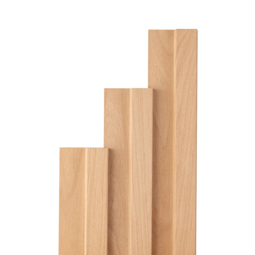 Three alder paneling boards of stepped lengths standing upright side by side, showing the flat face and edge