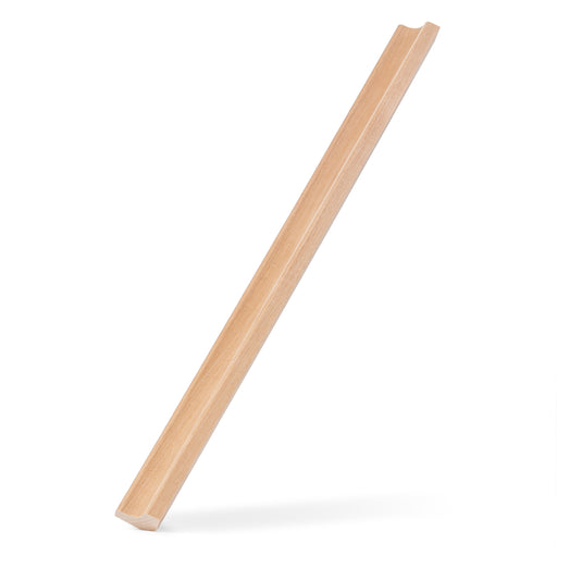 Alder 1x2 Inside Corner Trim piece standing upright at a slant, showing its long straight length and groove edge