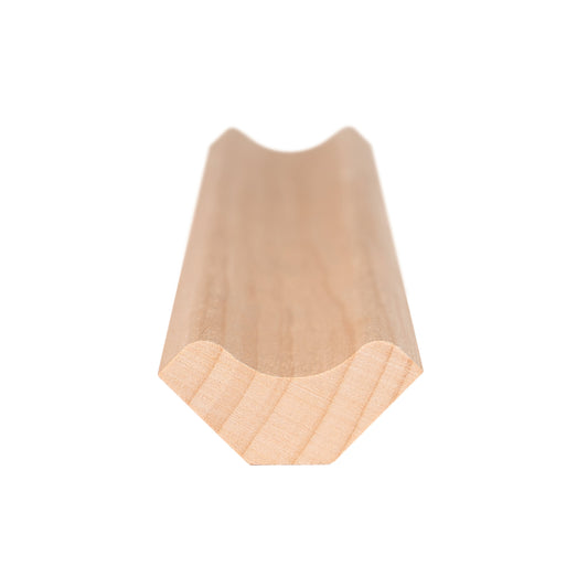 Alder 1x2 Inside Corner Trim piece end view showing the cross-section profile with a concave face and angled sides