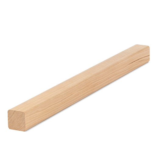 Alder 1x1 Trim piece lying at a slight angle, showing light grain on the long face and a square end