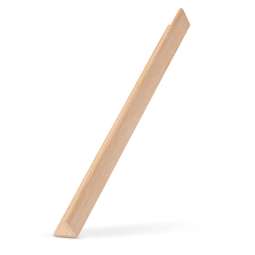 Alder 2x2 Outside Corner Trim piece leaning upright at an angle, showing the narrow L-shaped edge and face