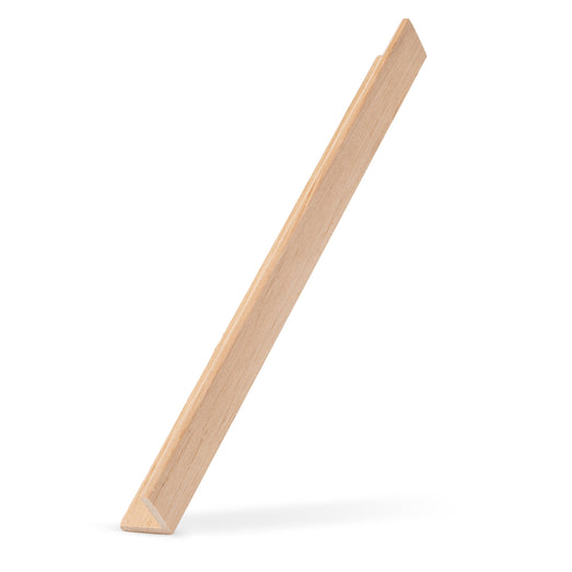 Alder 2x2 Outside Corner Trim piece leaning upright at an angle, showing the narrow L-shaped edge and face