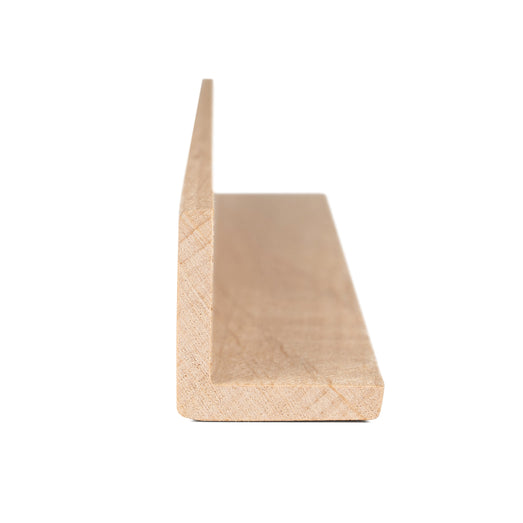 Alder 2x2 Outside Corner Trim piece, end view showing the L-shaped cross-section and cut grain