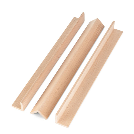 Three Alder 2x2 Outside Corner Trim pieces side by side, two resting on their L-shaped edges and one angled between them