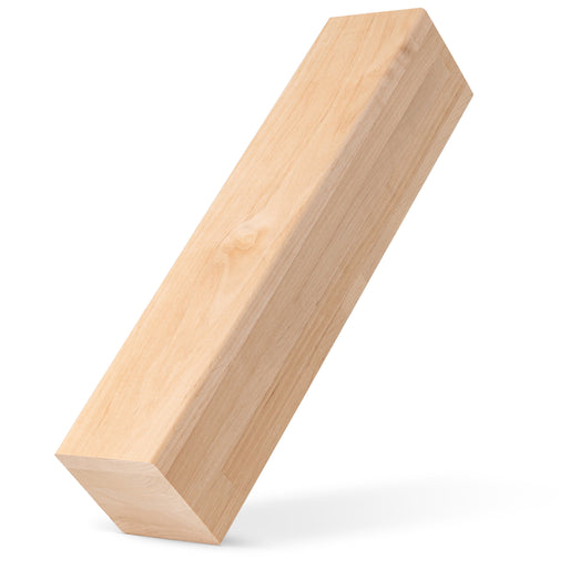 Alder 3x3 bench board standing tilted on one end, showing the face grain and a soft shadow beneath