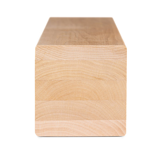 Alder 3x3 bench board end view showing glued layers and growth rings in the square cross-section