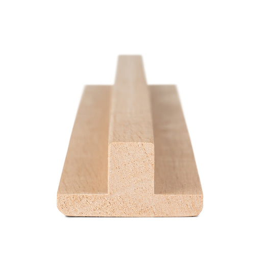 Alder 1x2 T-Molding piece end view showing the T-shaped cross-section with raised center rib and wide flange