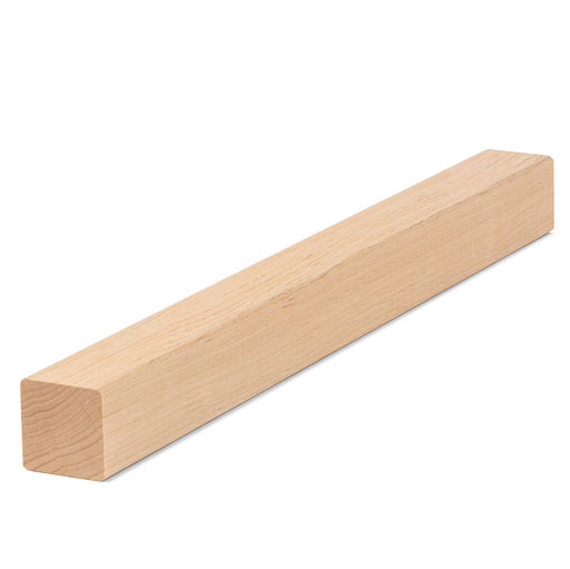 Alder 2x2 Trim piece, a long square wood strip with light grain, shown at an angle from one end