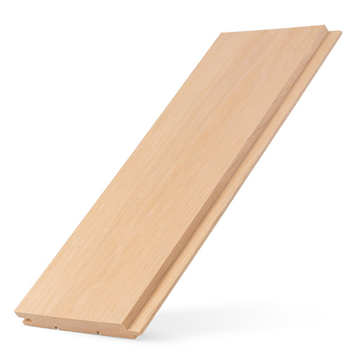 Alder 1x5 tongue-and-groove paneling board leaning upright, showing light face grain and the tongue edge
