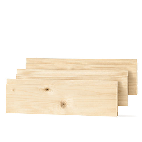 Three spruce 1x4 tongue-and-groove paneling boards side by side, staggered, showing knotty face grain
