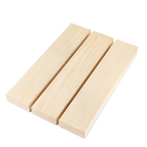 Three Aspen 2x3 bench boards side by side, showing the smooth face grain of each piece