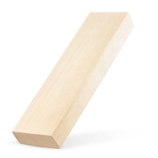 Aspen 2x4 bench board leaning upright at an angle against a white background