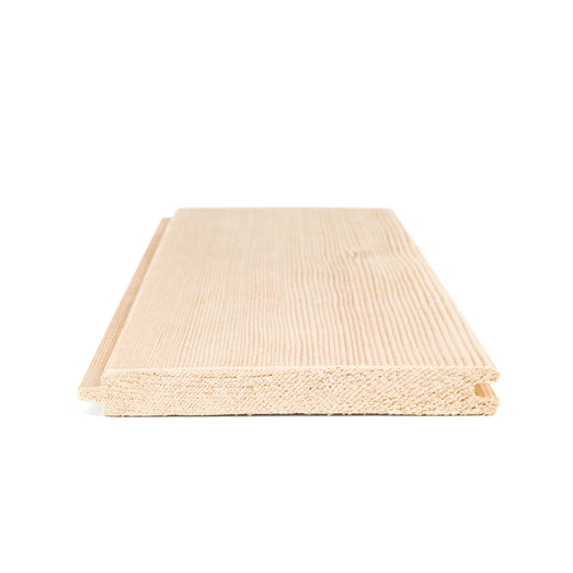 Hemlock 1/2x4 tongue-and-groove paneling board low angle view of the cut end, showing tongue and groove profile and grain