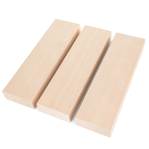 Three Hemlock 2x4 bench boards laid side by side with gaps, shown from above at an angle