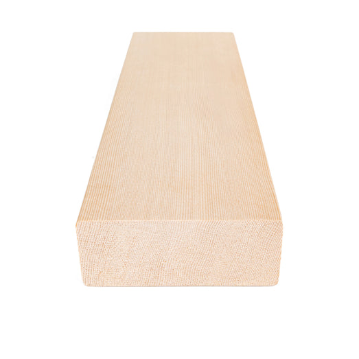 Hemlock 2x4 bench board with the end cross-section in front and straight face grain running down the length