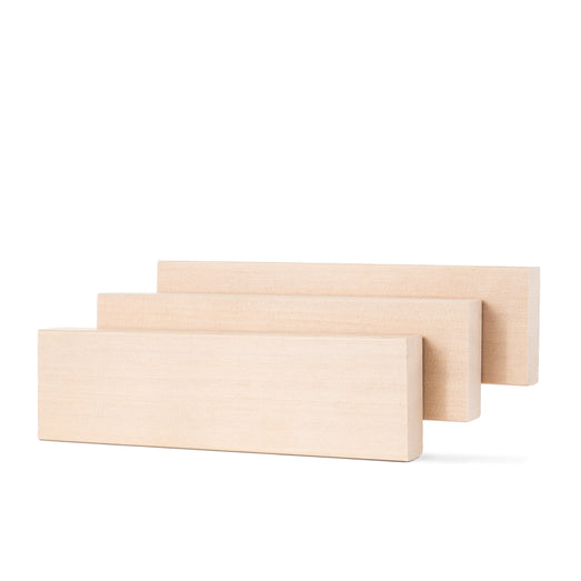 Three Hemlock 2x4 bench boards staggered side by side, shown from a low front angle on white