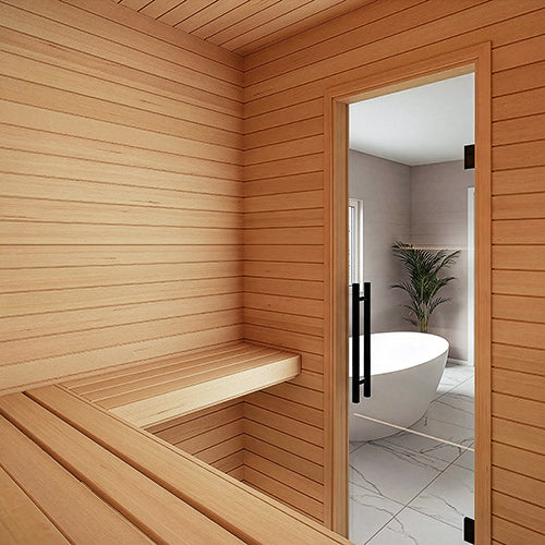 Sauna interior with horizontal wall paneling and two-tier benches, glass door open to a bathroom with a freestanding tub