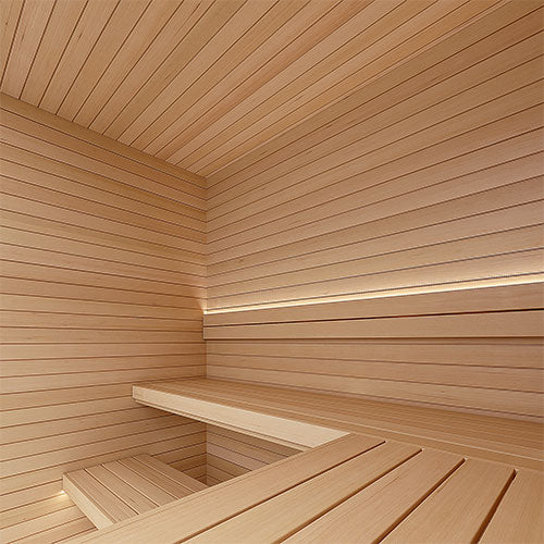 Sauna interior with horizontal paneling, corner bench and a strip of soft light along the upper wall