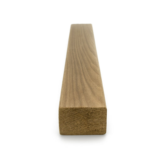 Thermo-Aspen 2x2 Trim piece shown head-on from the end, with the cut end grain in front and the length receding behind