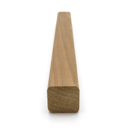 Thermo-Aspen 2x2 Trim piece with the square end facing forward, showing end grain and the long board receding behind