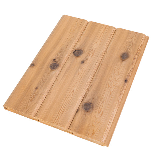 Three Western Red Cedar tongue-and-groove paneling boards joined edge to edge, showing knots and grain