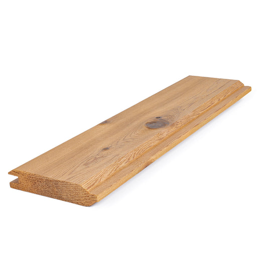 Western Red Cedar 1x4 tongue-and-groove paneling board, angled view showing knotty face grain and groove end