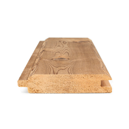 Western Red Cedar tongue-and-groove paneling board cross-section showing the tongue, groove and grain on the face