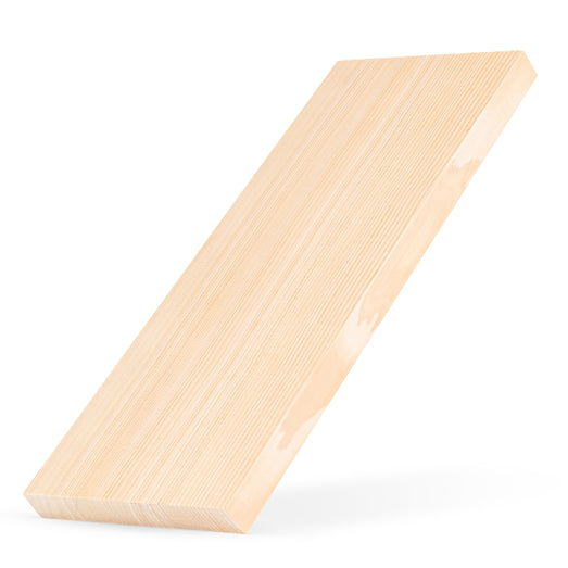 Hemlock 1x6 bench board leaning at a steep angle, showing face grain and edge