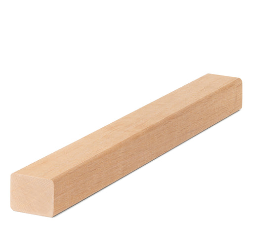 Alder 2x2 Trim piece lying flat, long angled view showing light face grain and the squared end with softly rounded edges