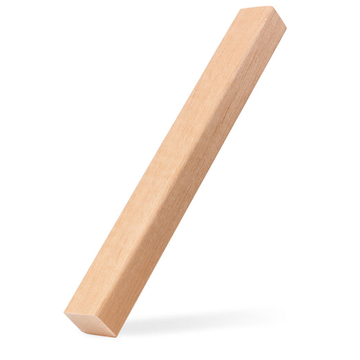 Alder 2x2 Trim piece propped upright at a slant, casting a soft shadow, showing the long face and narrow side