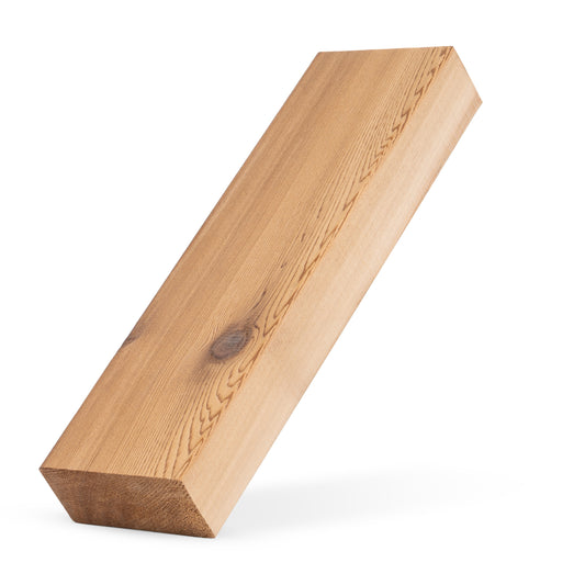 Western Red Cedar 2x4 bench board tilted at an angle, showing the grain pattern, a knot and the end cut