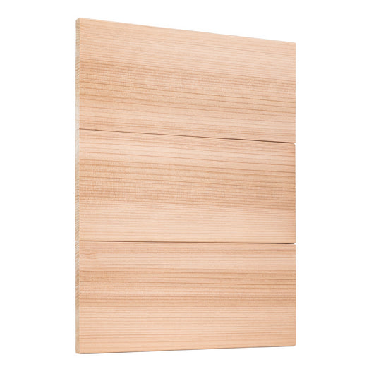 Western Red Cedar 1x6 bench boards, three stacked flat and edge to edge, standing upright with the grain running sideways
