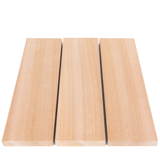 Three Western Red Cedar 1x4 bench boards side by side with narrow gaps, showing the end grain and face grain
