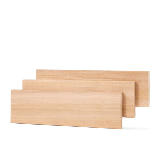 Western Red Cedar 1x4 bench boards in three staggered rows, showing the long edges and face grain